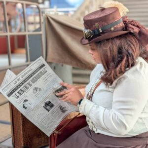 Alphonsine ( des aventures extraordinaires d'Alphonsine Gaillard) lit le journal